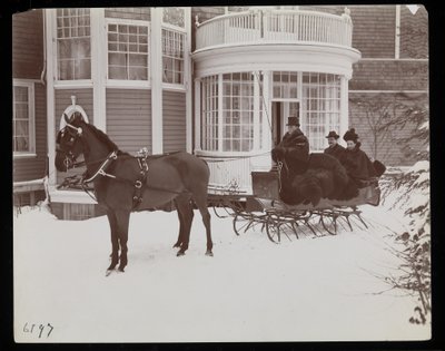 A Horsedrawn Sleigh in Front of the Westmoreland Davis Residence in Tuxedo Park, New York by Byron Company